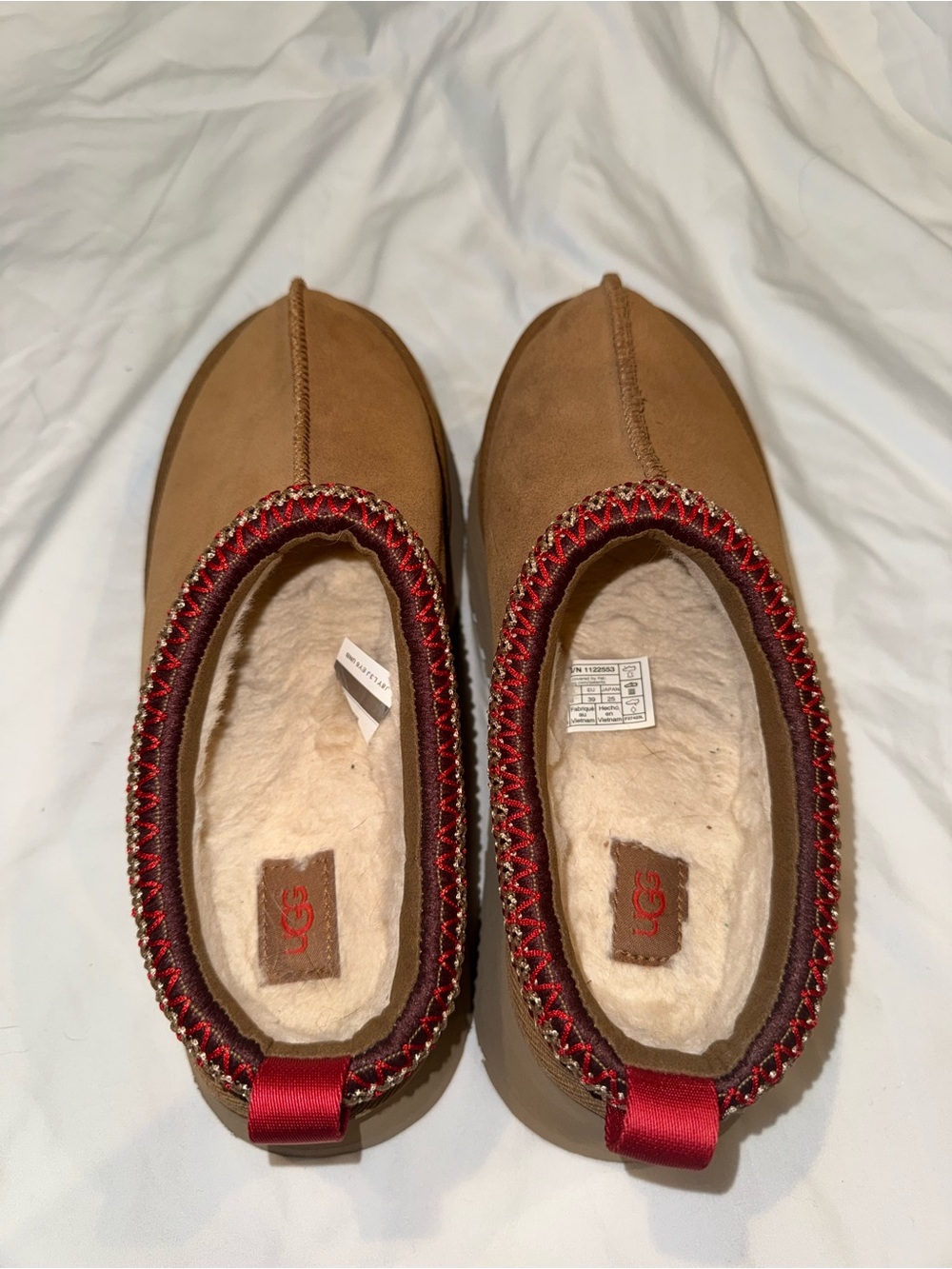 UGG Women’s Chestnut Suede Slip-On Shearling Slippers with Red Trim